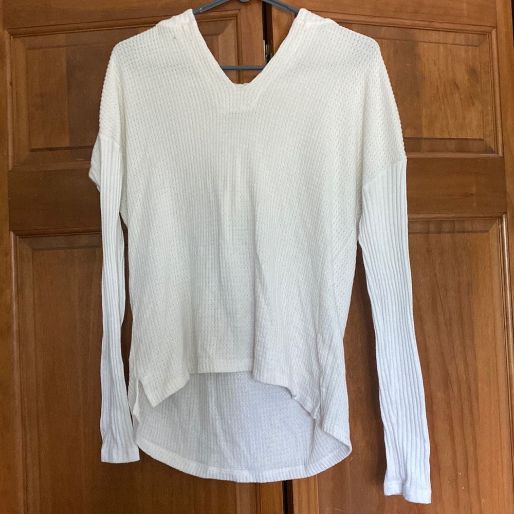 Size S white hooded sweater. no damages